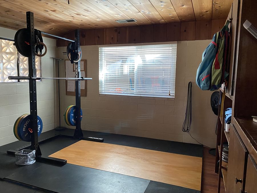 Home gym featuring a DIY weight lifting platform